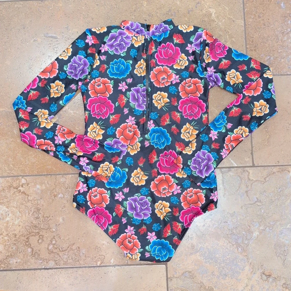 Mott50 girl one piece rash guard. Black and pink floral. Size 10. - Picture 3 of 3